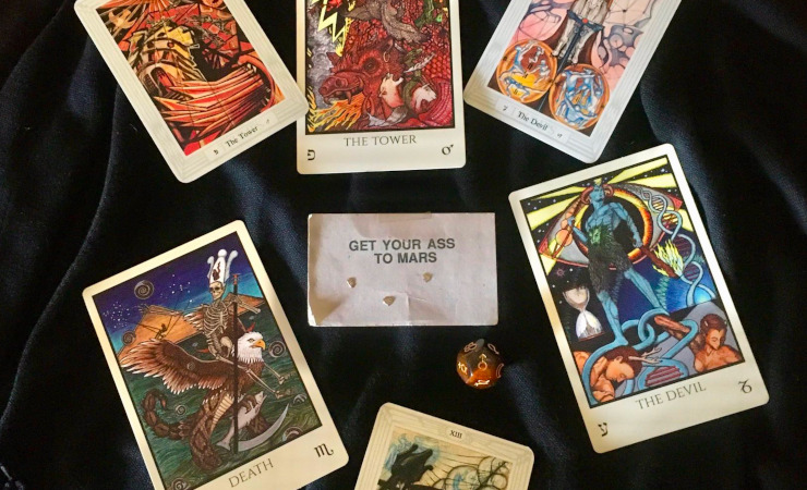 Tarot cards of Death, The Devil & The Tower surround a card that says "Get your ass to Mars